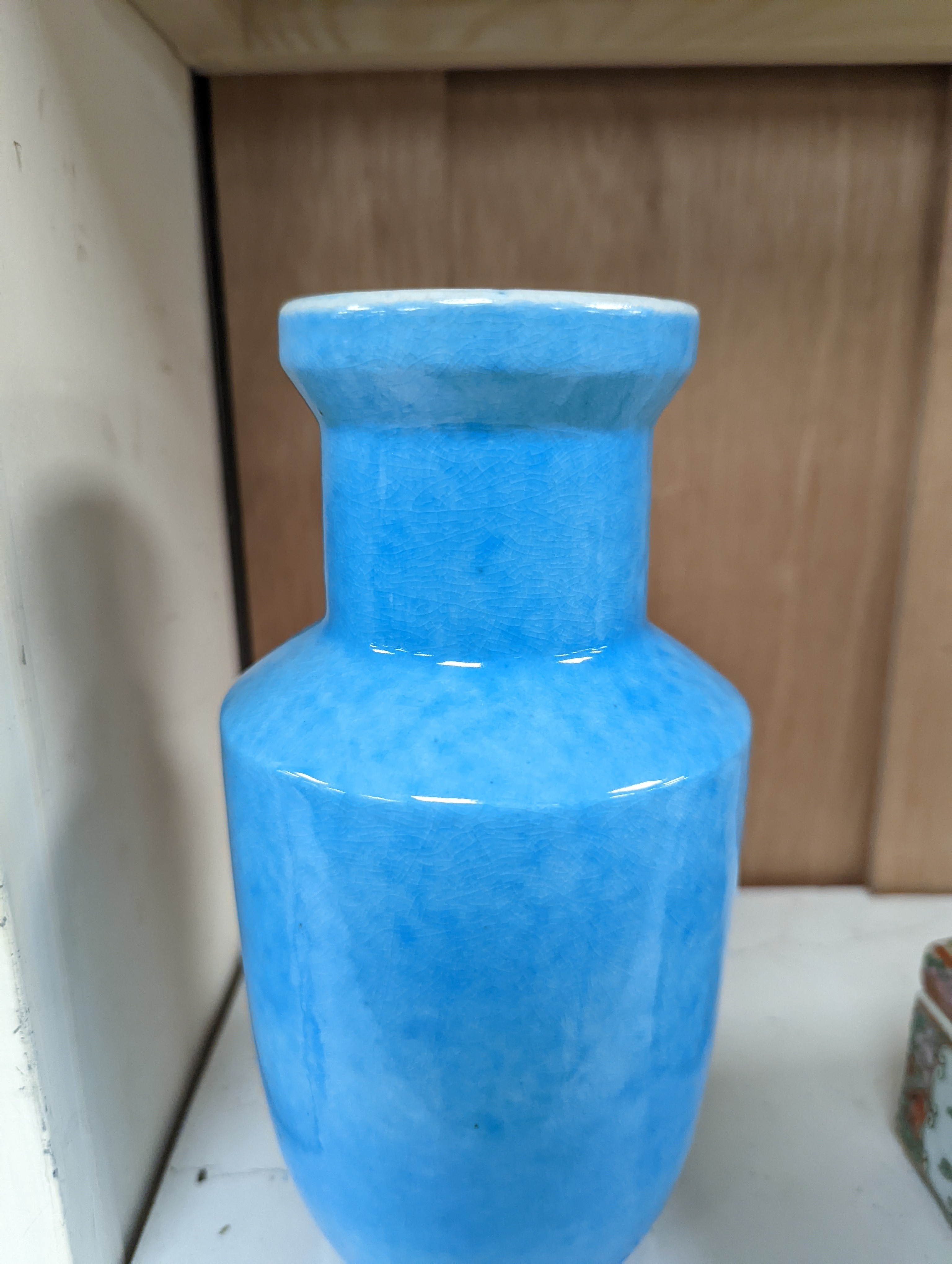 A Chinese turquoise glazed vase 22cm, with a fine crackle to the exterior glaze
